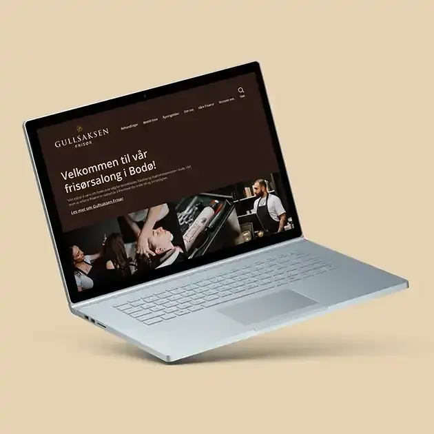 Illustrasjon som viser Gullsaksen Frisør sin hjemmeside på en laptop